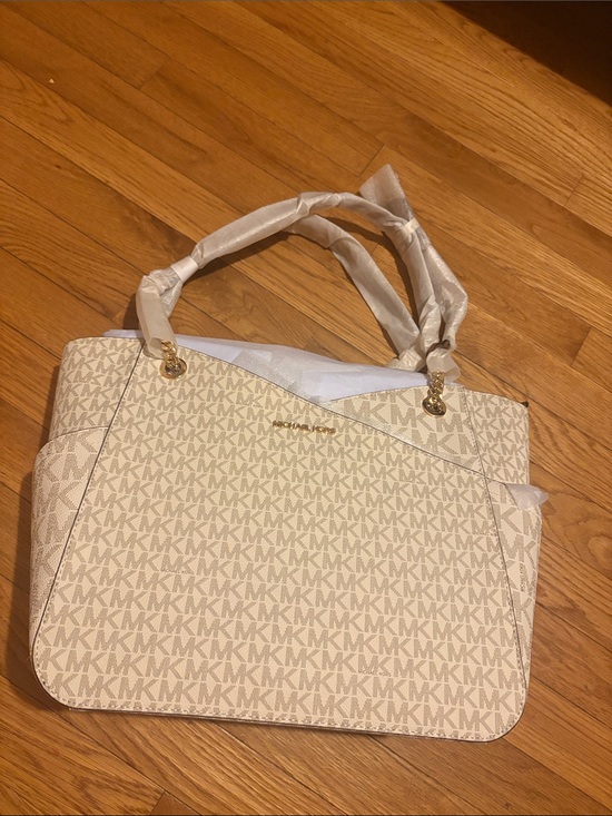 Michael Kors Handbags - Michael Kors Beige/Cream Monogram Tote with Gold Hardware